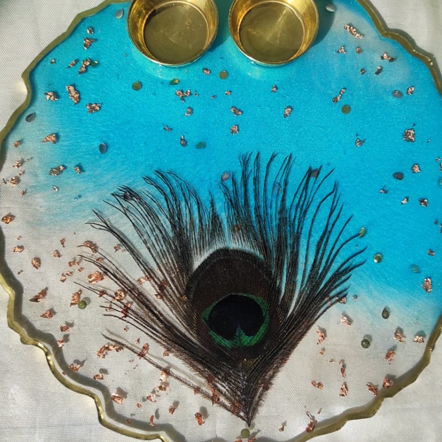 All Resin products: Personalized Photo Frame, Puja Platter, Haldi Kumkum Platter, Key Chain, Jwellery, Pendants, Watches , Tea Tray, Tea Coaster, etc